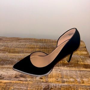 Black and silver pumps